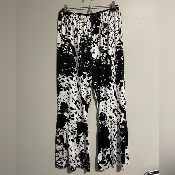 Pants - Small shop women’s xs Black and White cow print wide bell bottom Pants